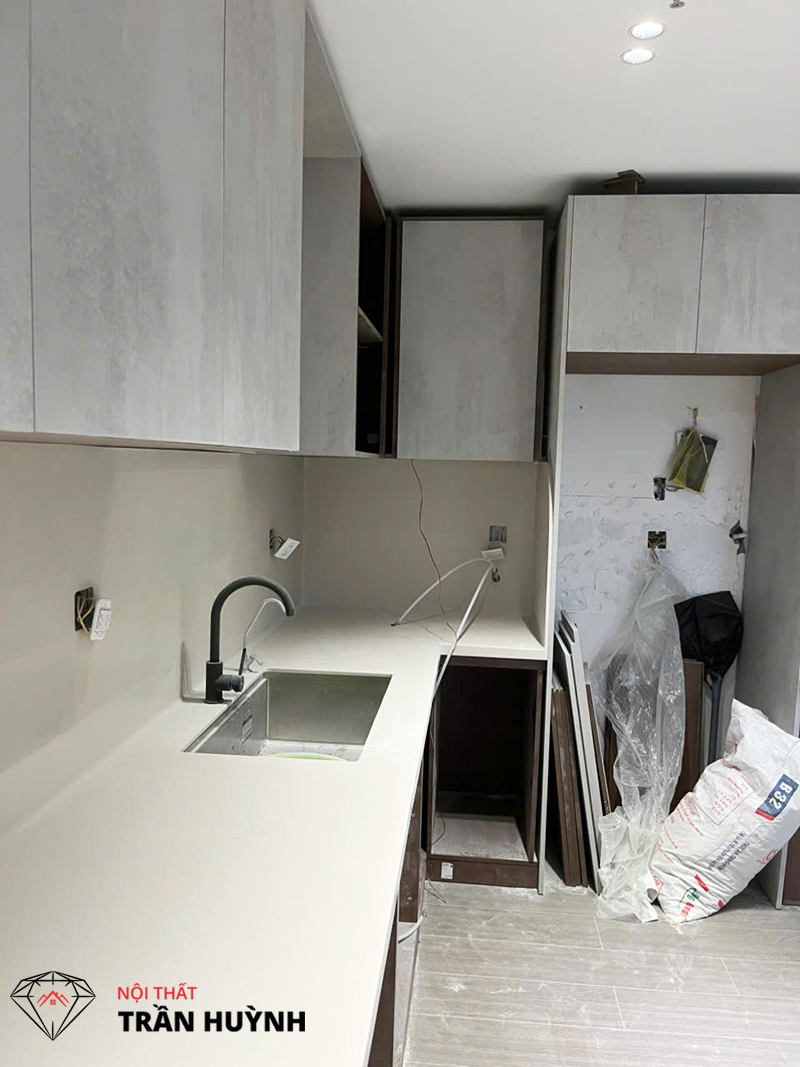 Công Trình Riverside Quận 7: Bộ Đôi Bếp Và Bàn Đảo S106 Sand Cookie Chuẩn Hiện Đại