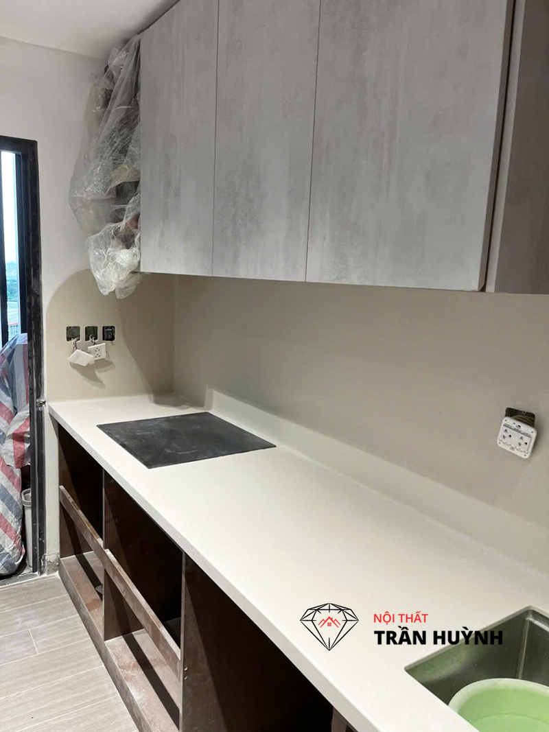 Công Trình Riverside Quận 7: Bộ Đôi Bếp Và Bàn Đảo S106 Sand Cookie Chuẩn Hiện Đại